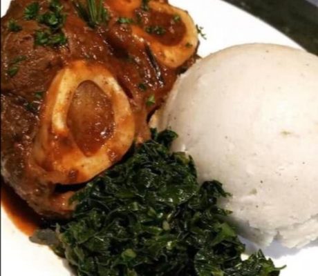 EAST AFRICAN FOOD. Ugali with Beef some greens on the side